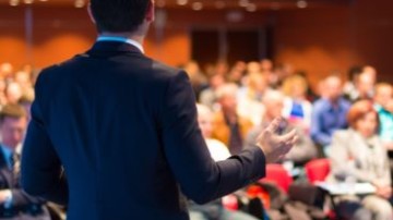 Man addressing an audience.