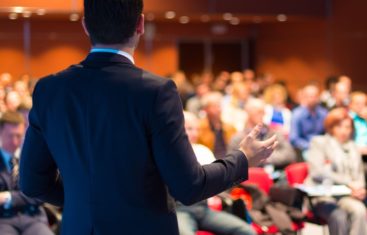 Man addressing an audience.