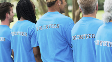 Group of men volunteering in a park